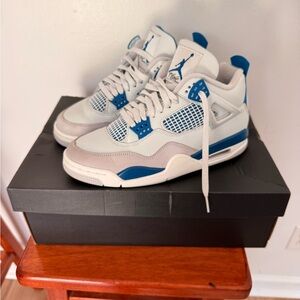 Air Jordan 4 Retro Blue and White Sneakers